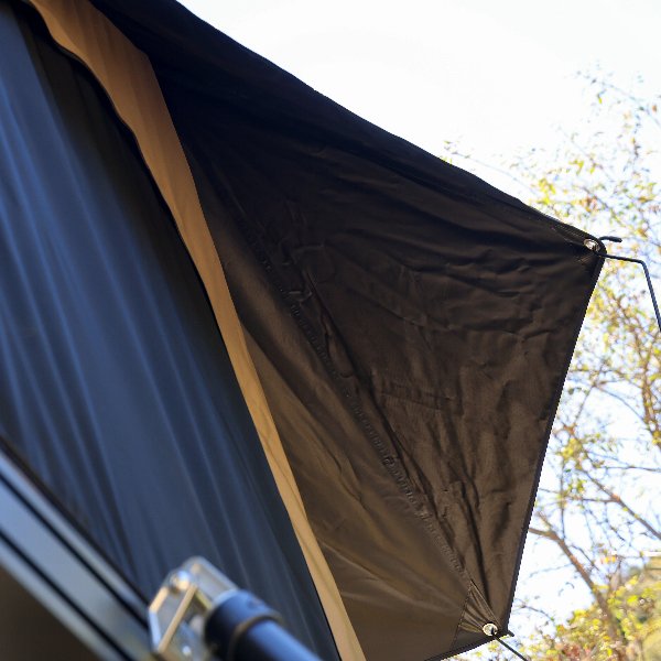 Close-up of canopy stitching and fabric tension on Roveroll Tri-Clam Roof Top Tent
