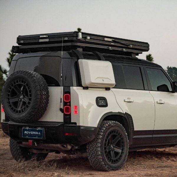 Closed angled profile on a truck of Roveroll Tri-Clam Hard Shell Roof Top Tent
