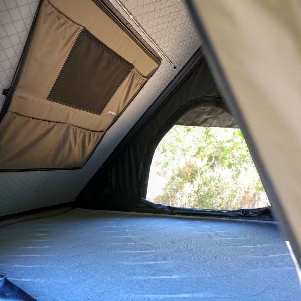 Interior view of Roveroll Tri-Clam Hard Shell Roof Top Tent