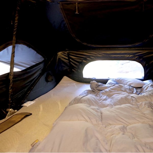 View from inside ROVEROLL Soft Shell Roof Top Tent while lying down